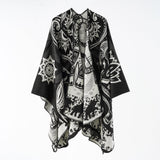 Poncho da donna con motivo floreale e frange