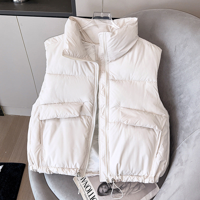 Gilet trapuntato corto da donna, isolante, con collo alto e bordo con coulisse