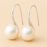 Orecchini eleganti a goccia con perle