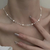 Collana elegante con perle luminose