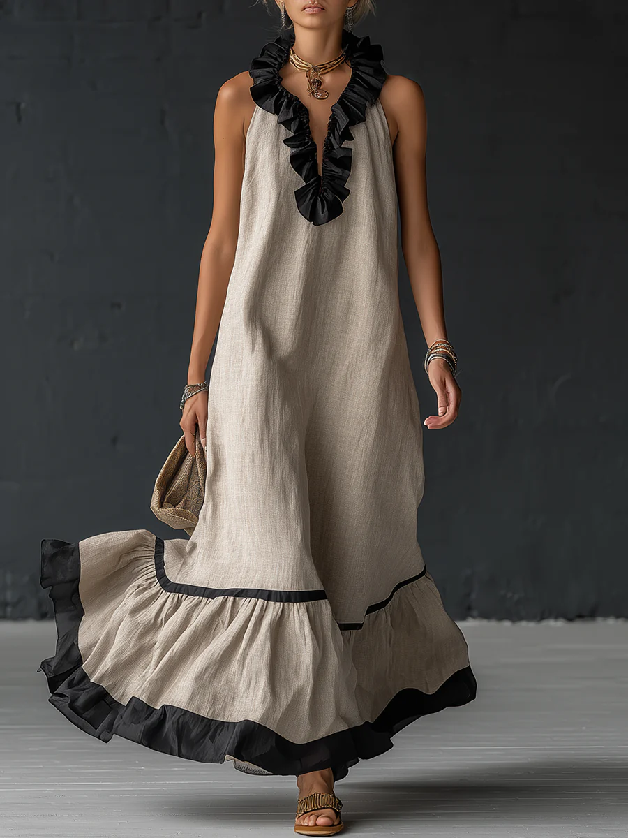 Abito maxi da donna senza maniche con tasche e bordo a volant
